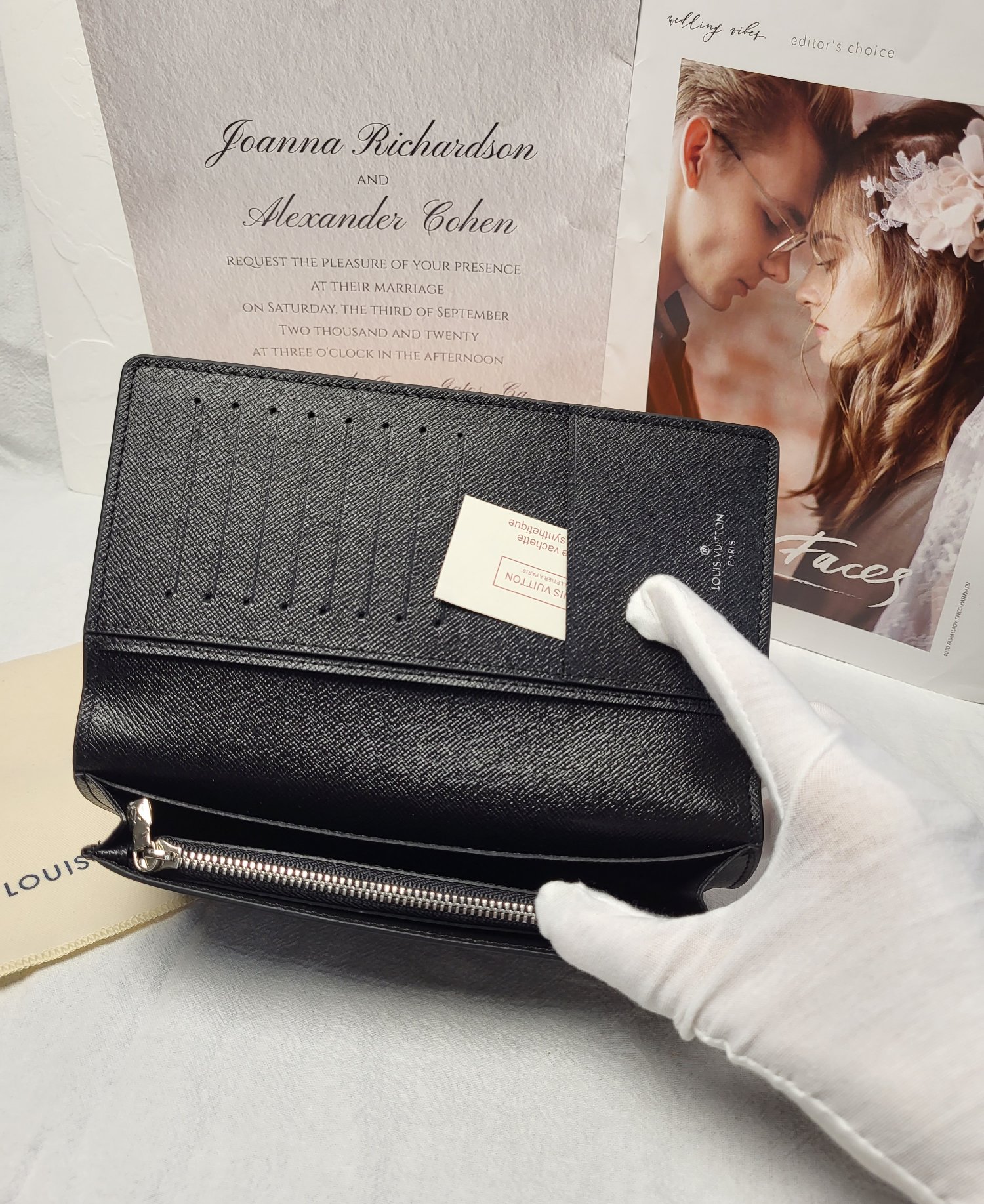 Leather bifold wallet in a gift box.