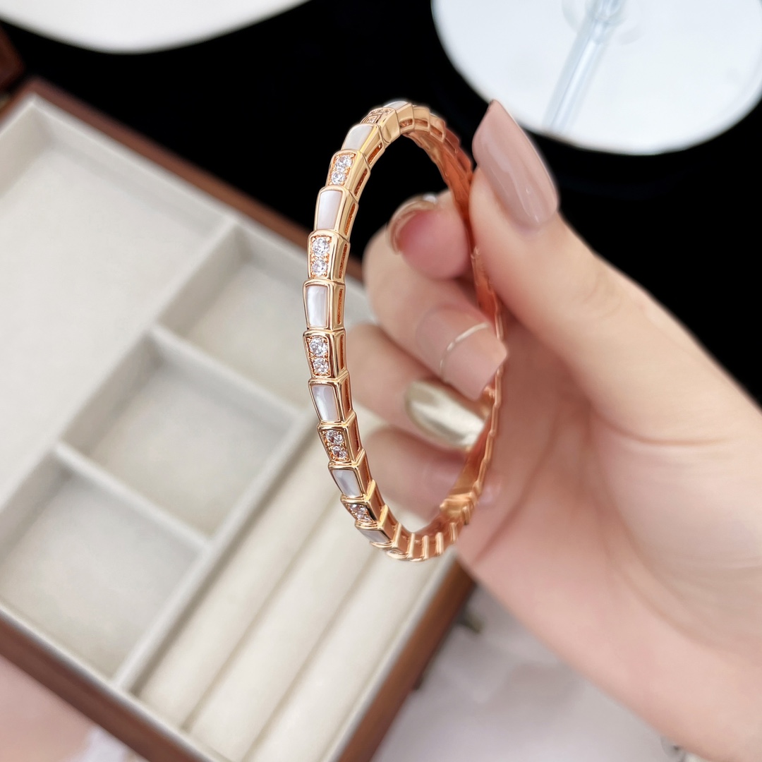 Luxurious Serpenti Viper Snake Bracelets: Elegant and Expensive Women’s Party Essential.