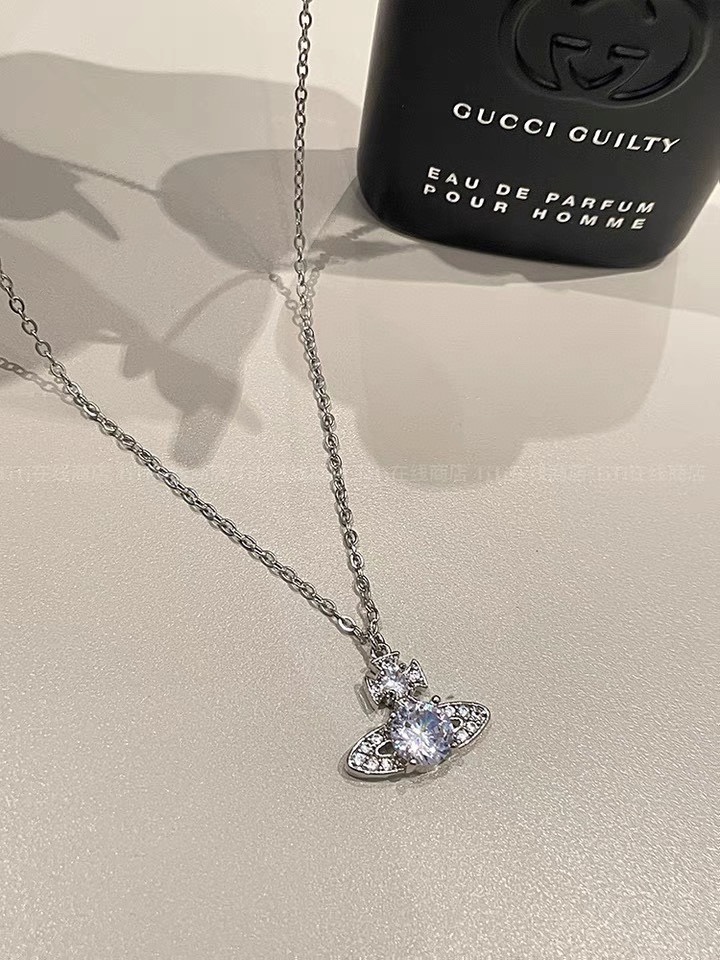 NO:103479,High quality vivienne westwood Queen Mother Vivian Saturn earring necklace!  British fashion designer, mother of punk in fashion!  Fashionable and trendy style, powerful quality, super beautiful design!  The simple and elegant embroidery logo is exquisite. There is no need to worry about not looking good because of the new design of classic elements!  The perfect choice for gifts, fully showing the personality style. The quality is very high, the whole jewelry gives people a big brand aura and is very exquisite, making the whole person's level improves several levels, definitely worth buying, Queen Mother's necklace, earrings, necklace19860909高品质vivienne westwood西太后薇薇安土星耳环项链！英国时装设计师,时装的朋克之母！时尚潮流风格,品质强大,超美的设计！简约大气刺绣Logo精致这个款不用担心不好看,因为经典的元素洋气的新设计！赠礼的完美之选,充分展现个性风范.品质非常整个首饰给人大牌气场的同时又非常精致,让整个人的层次提升好几个level绝对值得入手,西太后项链,earrings,necklace,Jewelry