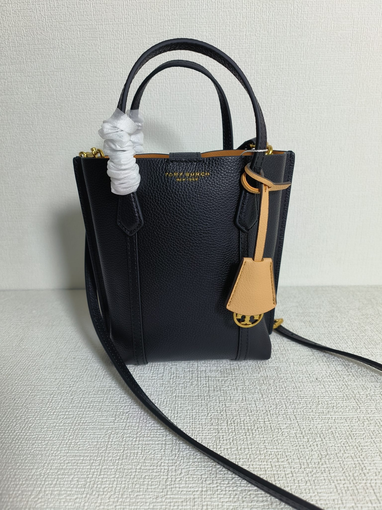 Tory Burch ～616#TB新款迷你购物袋 头层荔枝纹牛皮材质 内里全皮 可手提单肩 LOGO吊坠