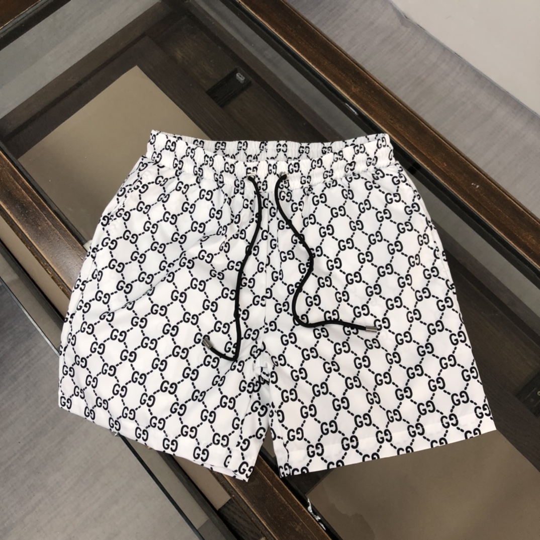Gucci Short de Plage Imprimé Logo, Collection 2025 - Confort et Style