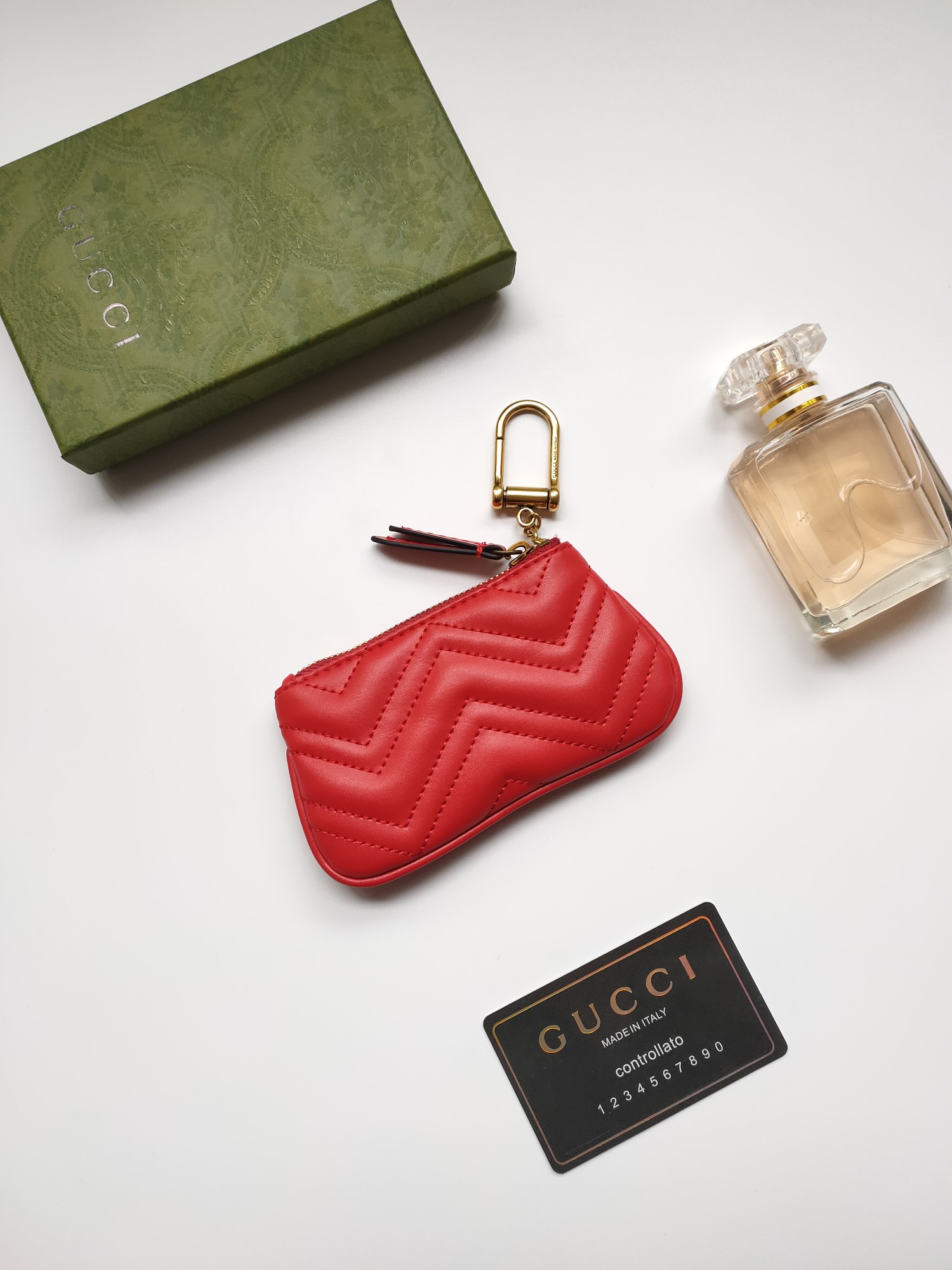 GUCCI小銭入れ リップポーチ 小牛皮製 波浪模様