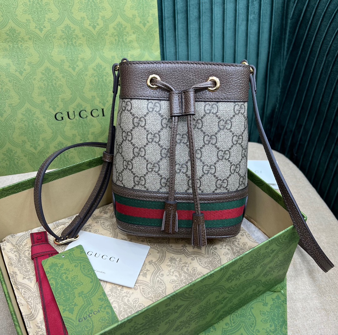 [Top-tier original factory leather]  
Gucci Ophidia Nano Mini Bucket Bag 🪣  
🔥 Premium materials, original factory quality. Latest G Ophidia Nano mini bucket, newest model! Sold out instantly at official stores, the new must-have! Classic double G pattern, looks more luxurious, a standout style piece. Can be carried by hand or worn crossbody. Spacious enough, even fits a Plus phone! Very stylish on.  
Size: 18.5 x 15 x 9 cm  
Model: 550620 image 1