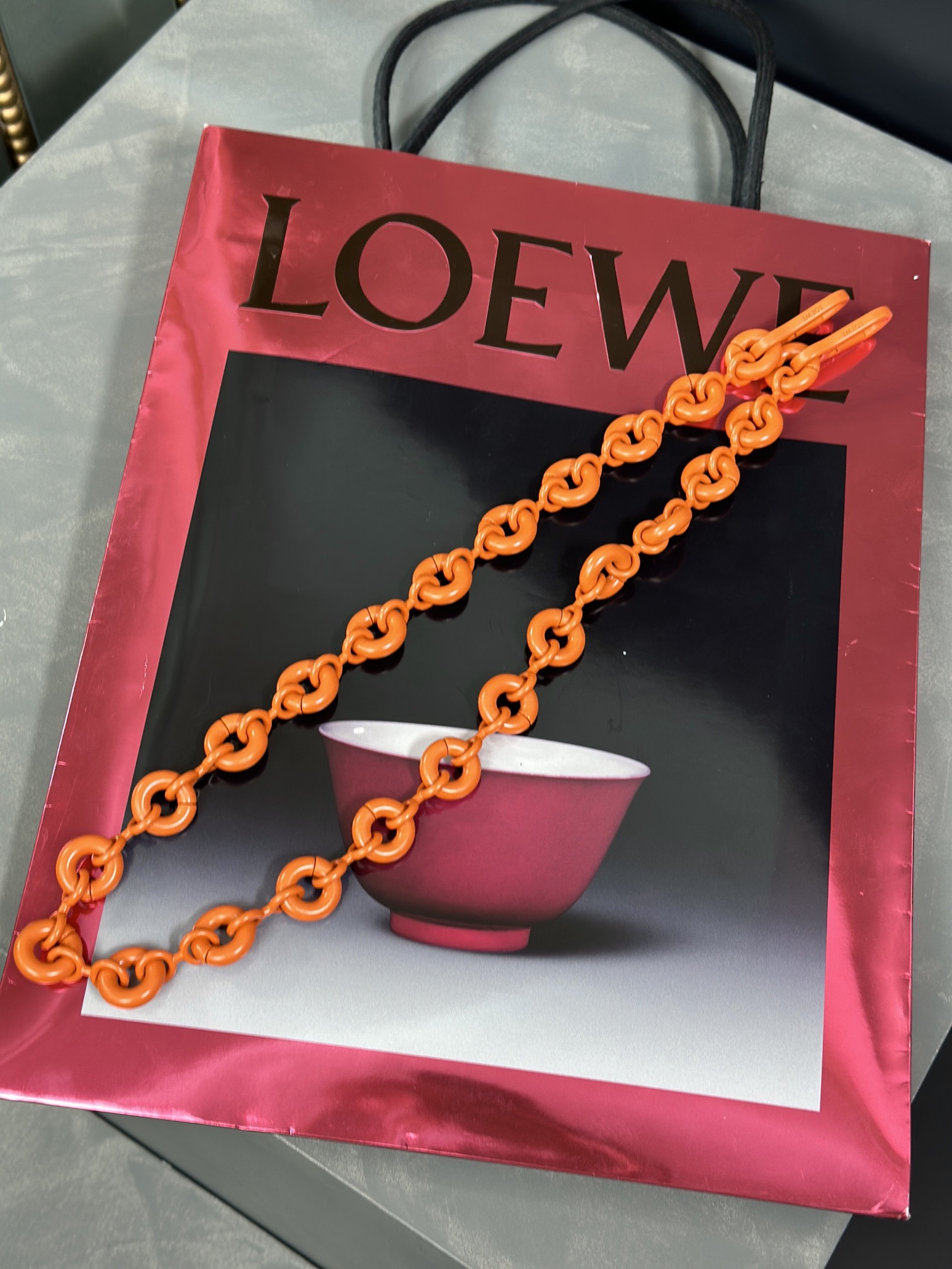 Where can I buy
 Loewe Bags Handbags Orange Chains