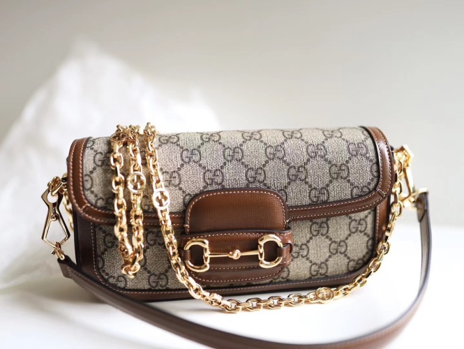 Gucci Horsebit 1955 Saddle Baguette Bag with Chain Strap 1 Gucci Horsebit 1955 Saddle Baguette Bag with Chain Strap