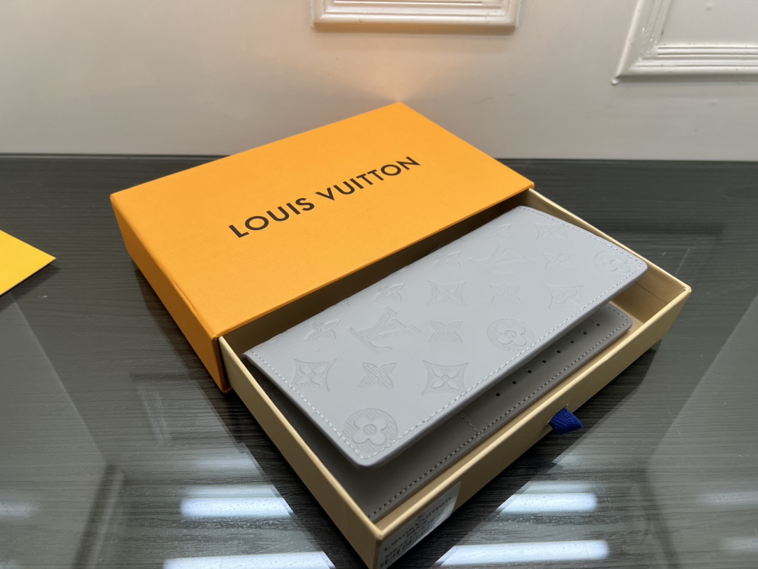 Front view of a stylish leather bifold wallet.