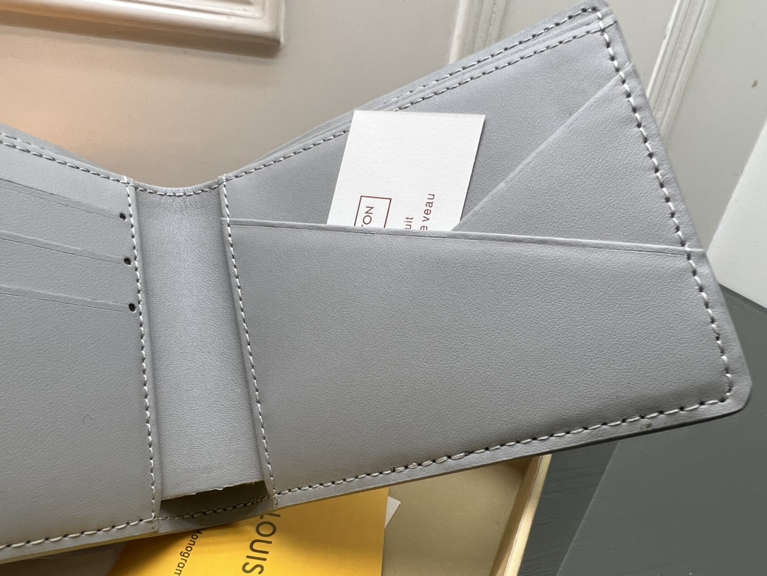 Leather wallet in hand