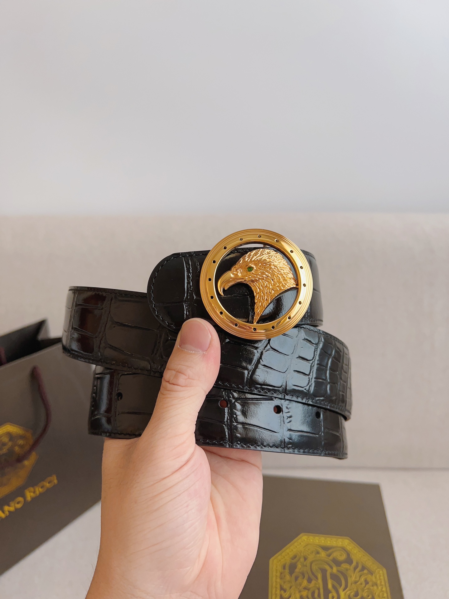 Italian Quintium Gold Eagle-Head Steel Button Belt with Gator Strips: Stylish and High-Quality.