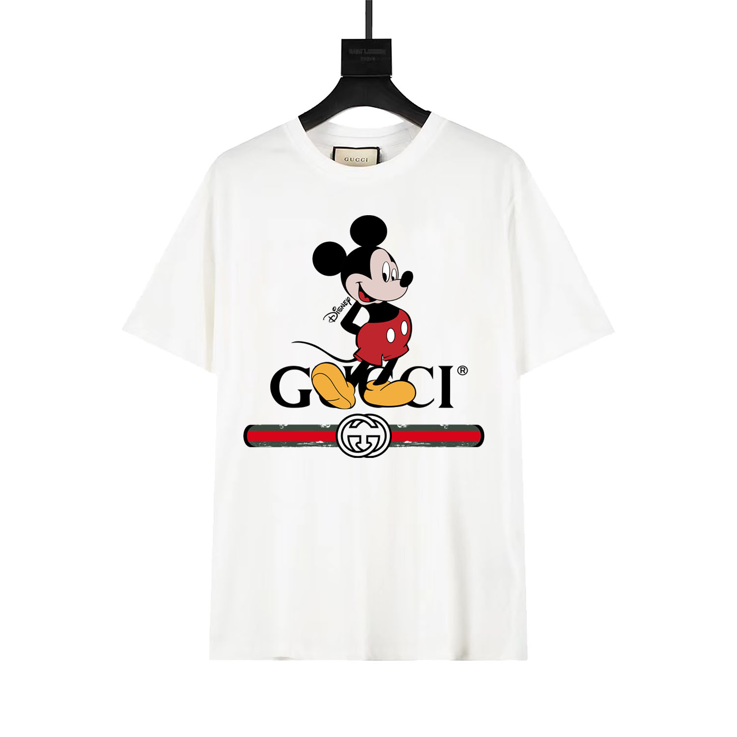 Gucci Edición colaboración Gucci x Disney. Camiseta de manga corta con estampado de Mickey de gran tamaño. Mismo modelo…