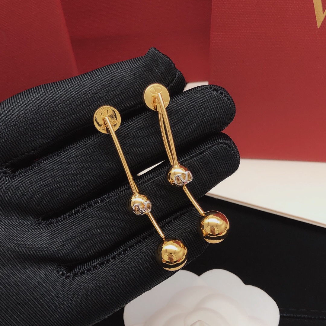 Número VED0012 Pendientes Valentino de flecos con bolas lisas