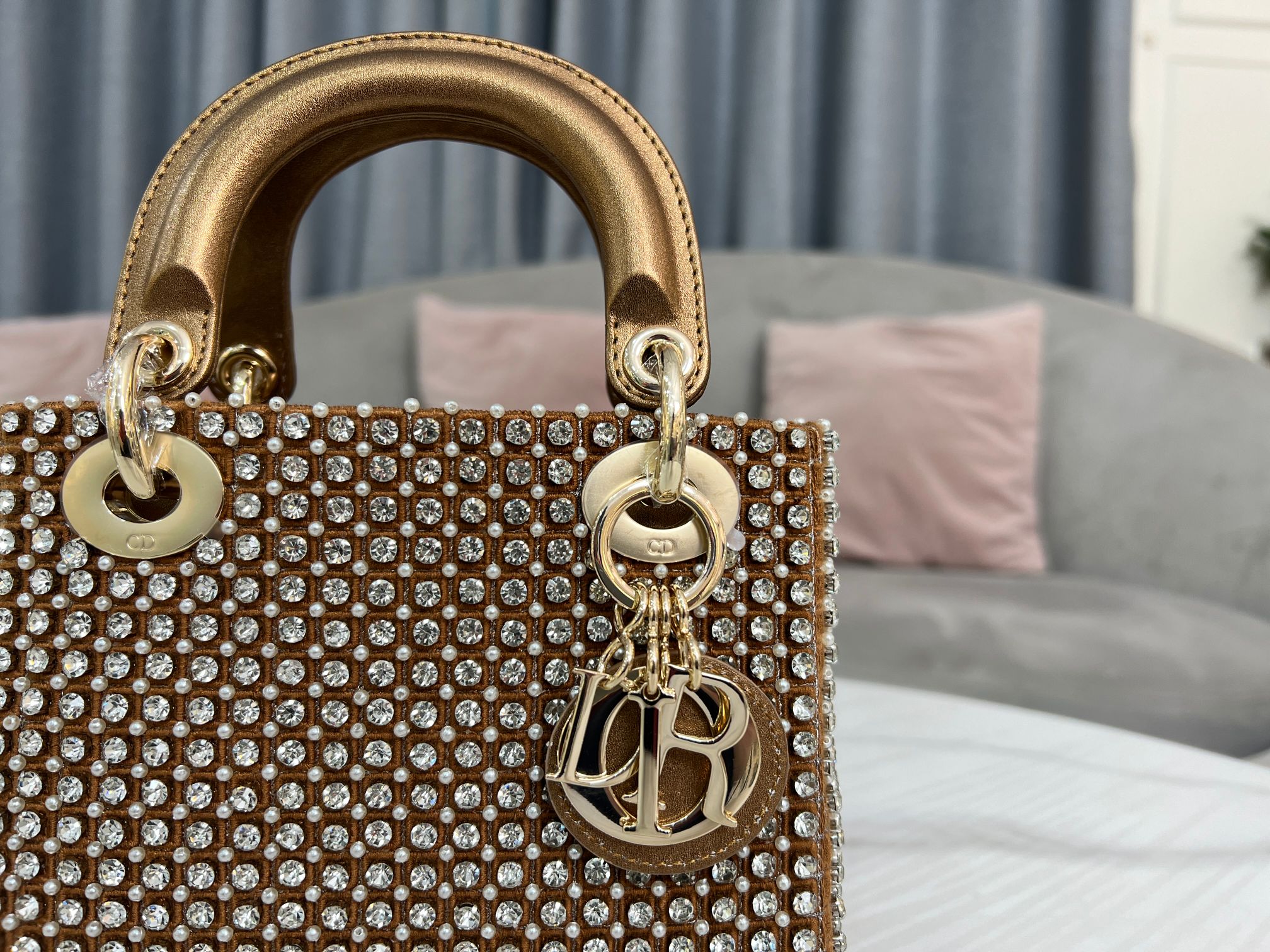 Dior Lady Dio, r three-frame embroidery in gold with diamonds