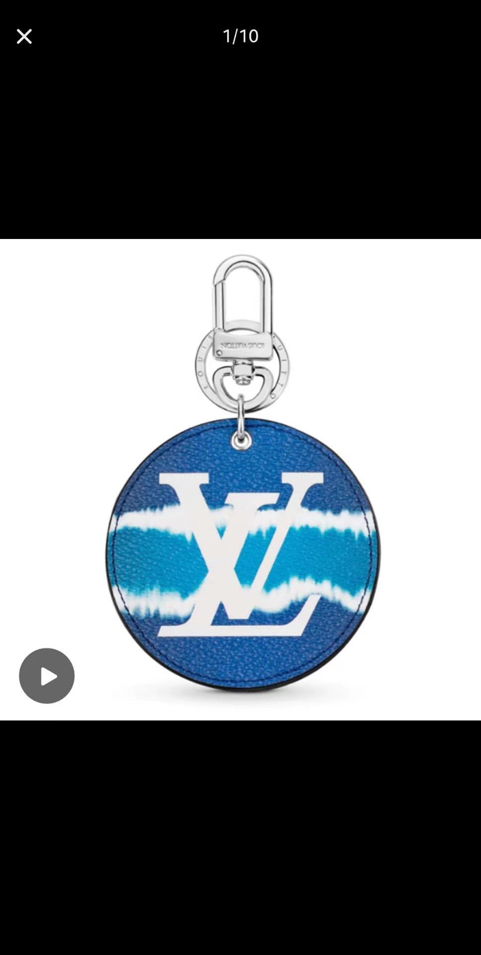 A group of round disc keychains.