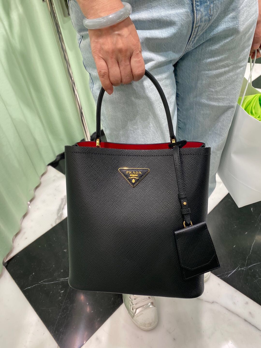 prada bucket bag is not only fashionable but also practical
