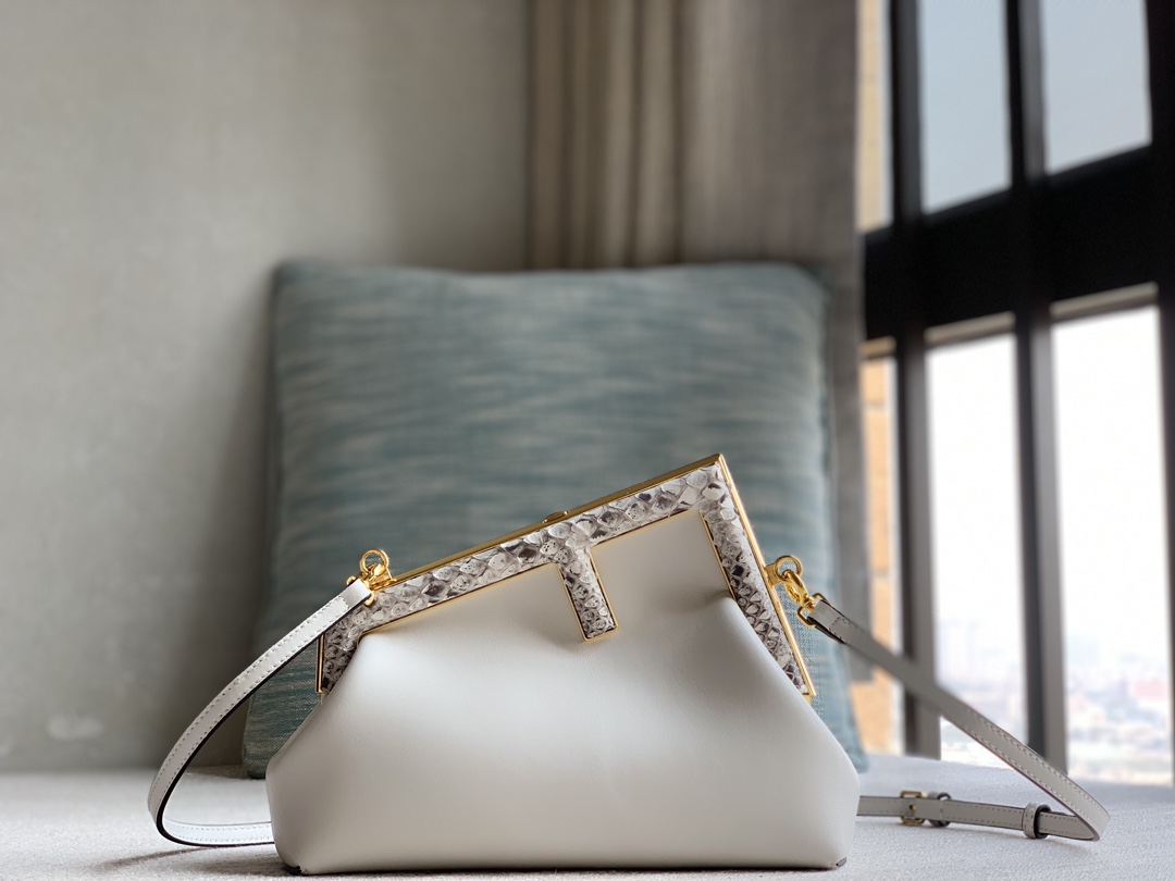Fendi First series genuine snakeskin small handbag, made of lambskin, decorated with an oversized F metal buckle, and covered with luxurious pyth