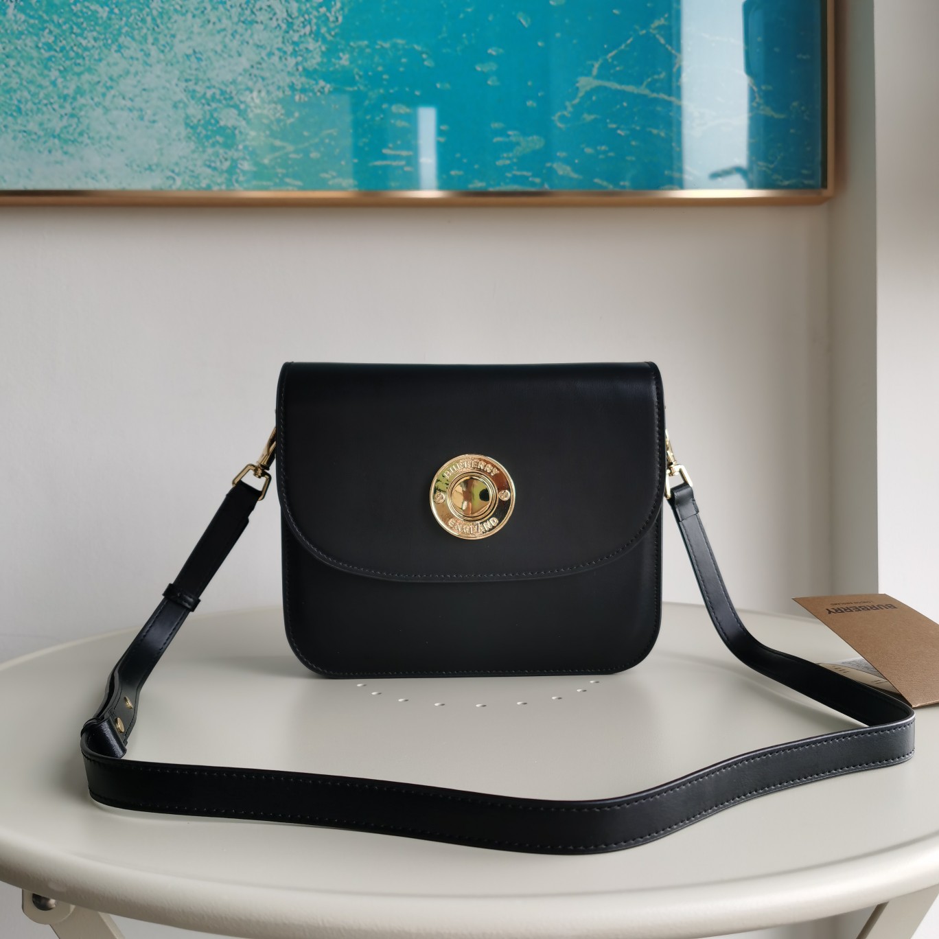 Burberry's upright college style sloping backpack is made of Italian tanned leather. Paired with front panel design, creating an elegant curved shape. Paired with gold-plated logo decorative holes and brand logo shaped glossy push buttons. Salute to the brand's history, the bag is named after the mother, sister, and eldest daughter of founder Thomas Burberry. Can be carried diagonally or with a detachable and adjustable shoulder strap.Size: 23.5 x 7 x 19.5cmMinimum vertical wearing length of shoulder strap: 48cmThe longest vertical wearing length of shoulder straps: 52cm