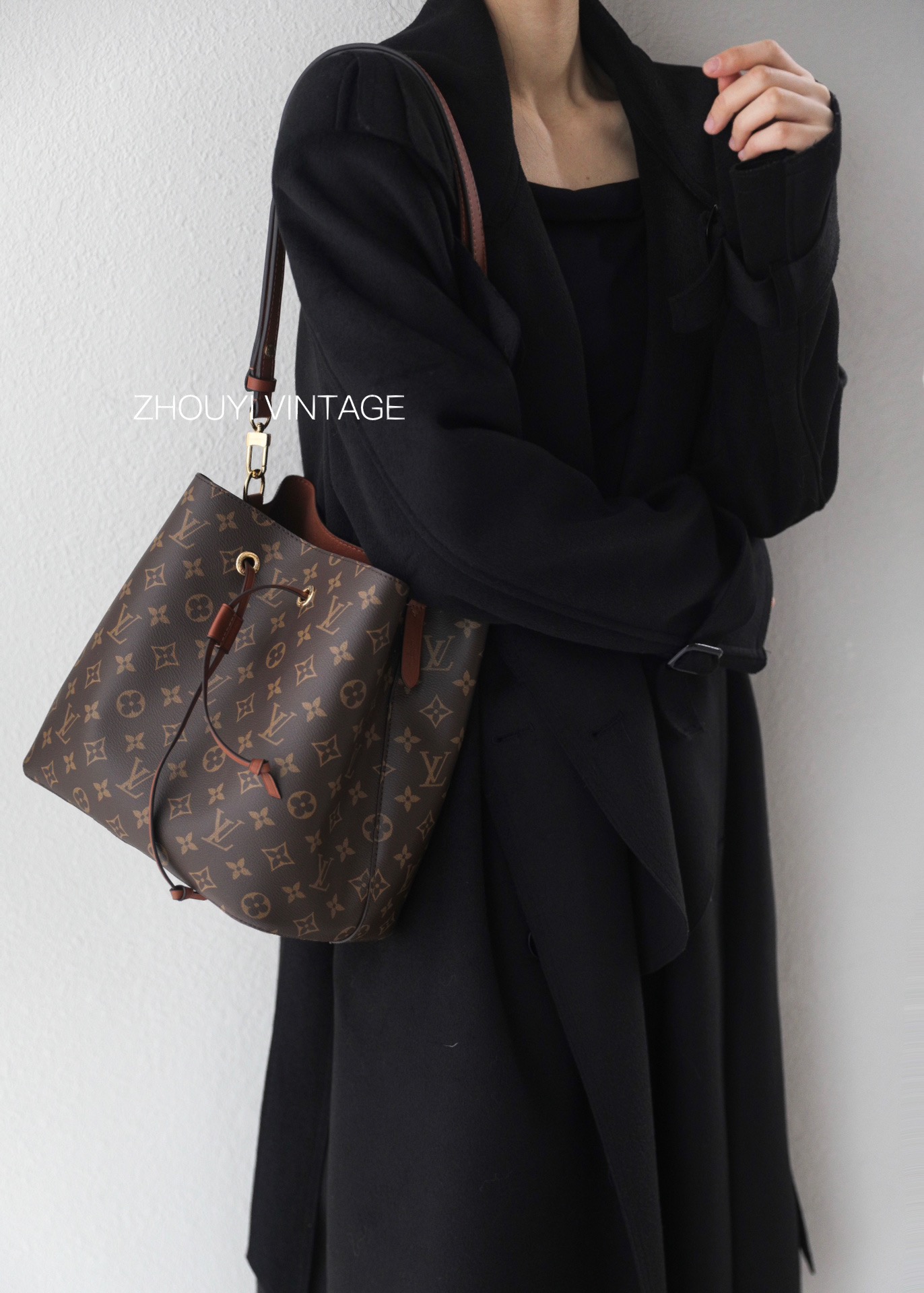 Brown bucket bag, a different kind of surprise