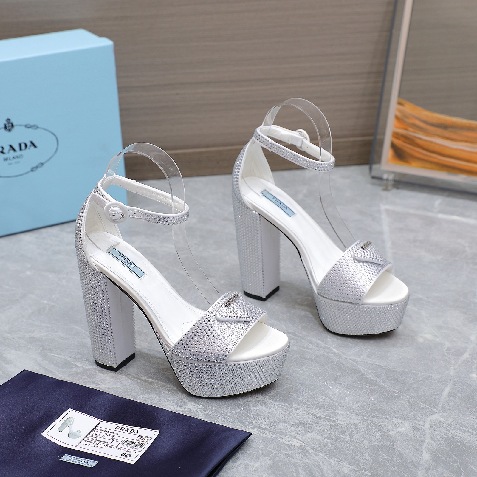 NO:438592,Prada SS's latest catwalk fashion silk full diamond high heels. Original purchase, details are compared with the original!  Top quality!  Accurate to 11. Light luxury without tiring your feet. You can match spring and summer clothing at will, which will show more texture and taste. Simple and luxurious appearance. Even if it is just a sandal. It is definitely a must-have pair for summer shoe cabinets. Imported silk and imported diamonds. Colors are six colors and six smooth. Inner footbed imported sheepskin inner lining. Outsole Italian leather outsole. Heel height 14cm. Size 35-41 (42 needs to be customized). High heels sandals, prada, prada, sandals, high heels, sheepskin, real silk, Leather soles19860909Prada 普拉达ss最新走秀时装真丝满钻高跟鞋 原版购入、细节对照原版！顶级品质！ 精确到11 轻奢而不累脚、上脚可随意搭配春夏的服饰、更加彰显质感和品味、简约中带奢华的外观、哪怕只是一款凉鞋 绝对是要在夏日鞋柜必备双 鞋面进口真丝加进口钻 颜色六色、六六大顺 内里垫脚进口羊皮内里 大底意大利真皮大底 跟高14cm 码数35-41（42需要订做）,高跟鞋凉鞋,prada,prada,sandals,high heels,sheepskin,real silk,Leather soles,Women's Shoes