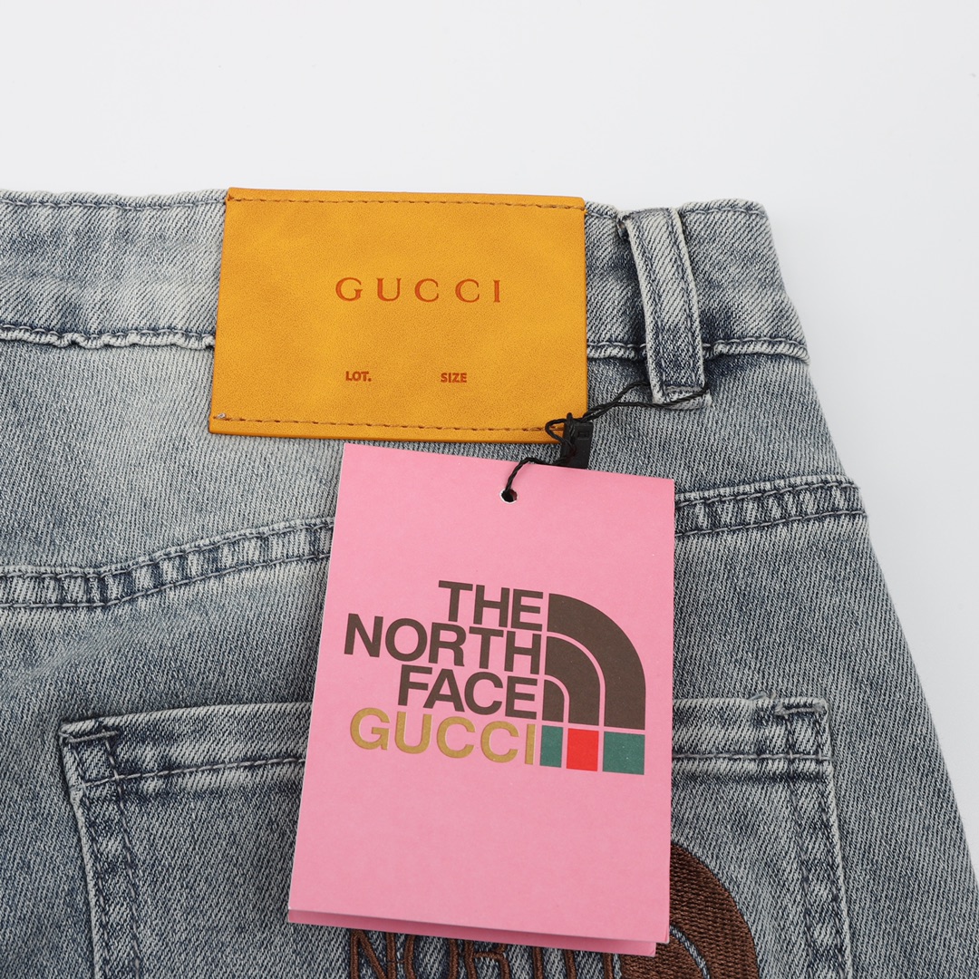 GUCCI/古驰 联名北面简约复古经典皮标LOGO牛仔裤