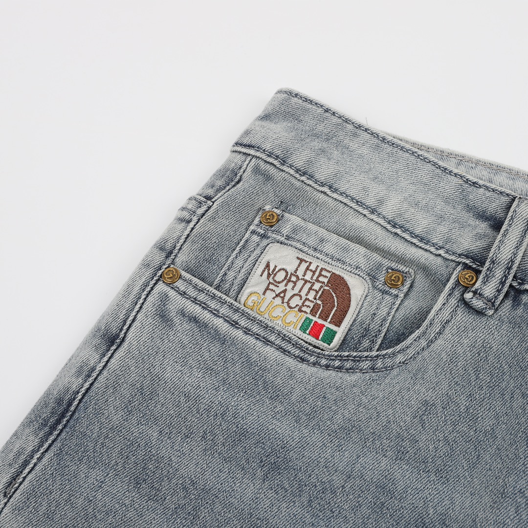 GUCCI/古驰 联名北面简约复古经典皮标LOGO牛仔裤