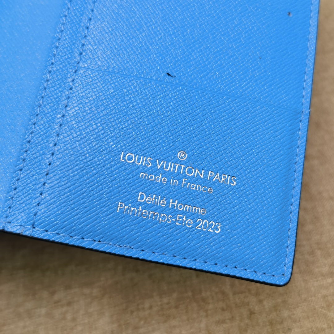 Elegant leather long wallet in hand