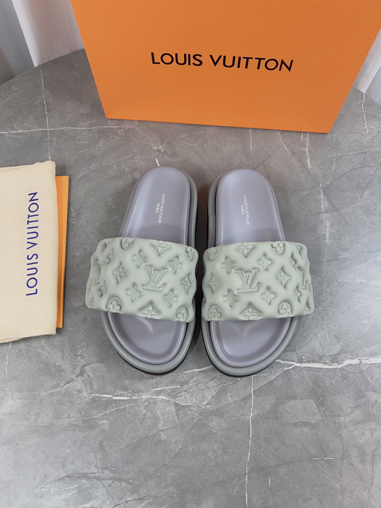 Louis Vuitton Pool Pillow Comfort Flat Sandal Monogram Embossed Slides 5 i1679661603 2916 4