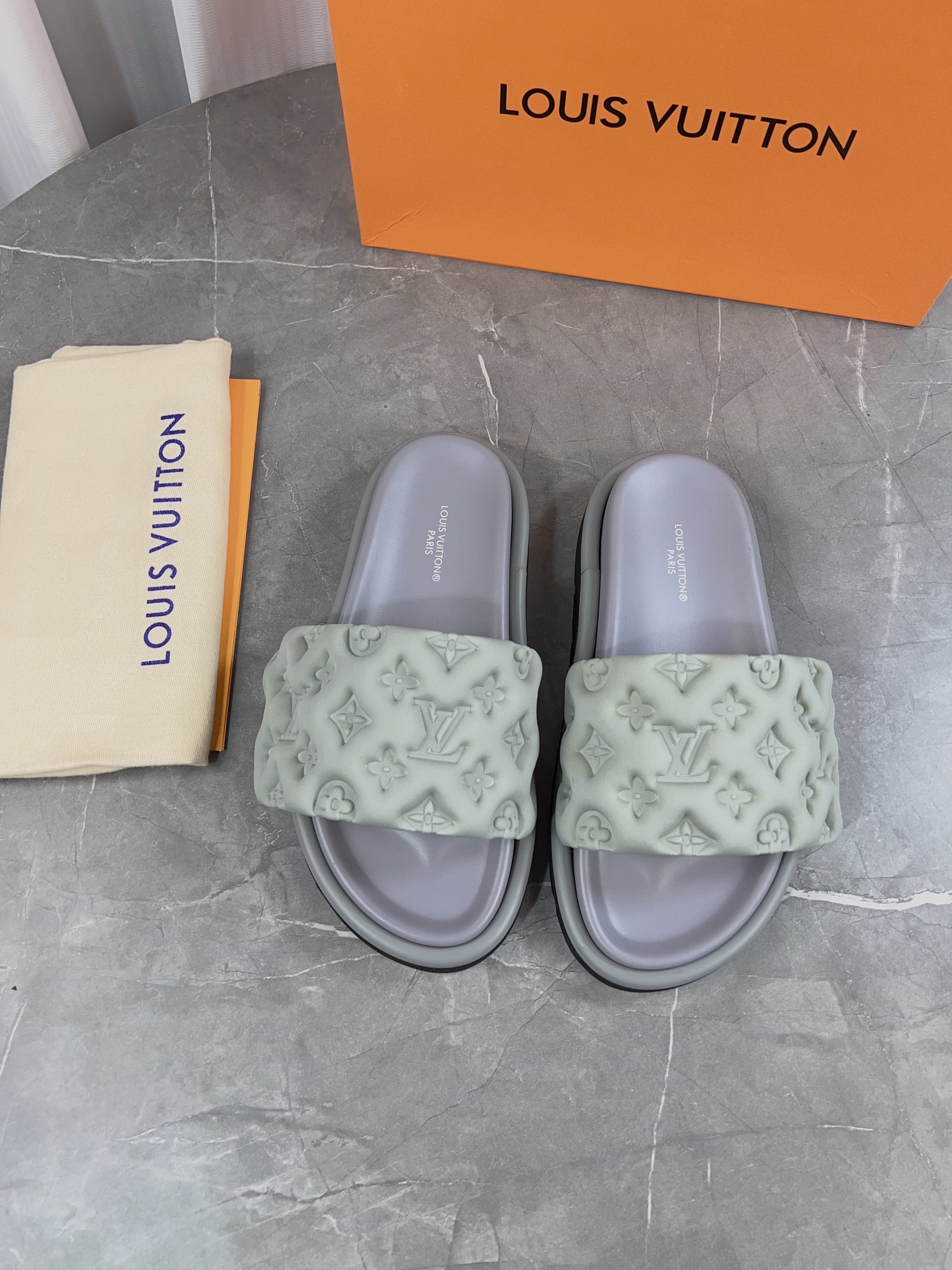 Louis Vuitton Pool Pillow Comfort Flat Sandal Monogram Embossed Slides 3 i1679661603 4515 1
