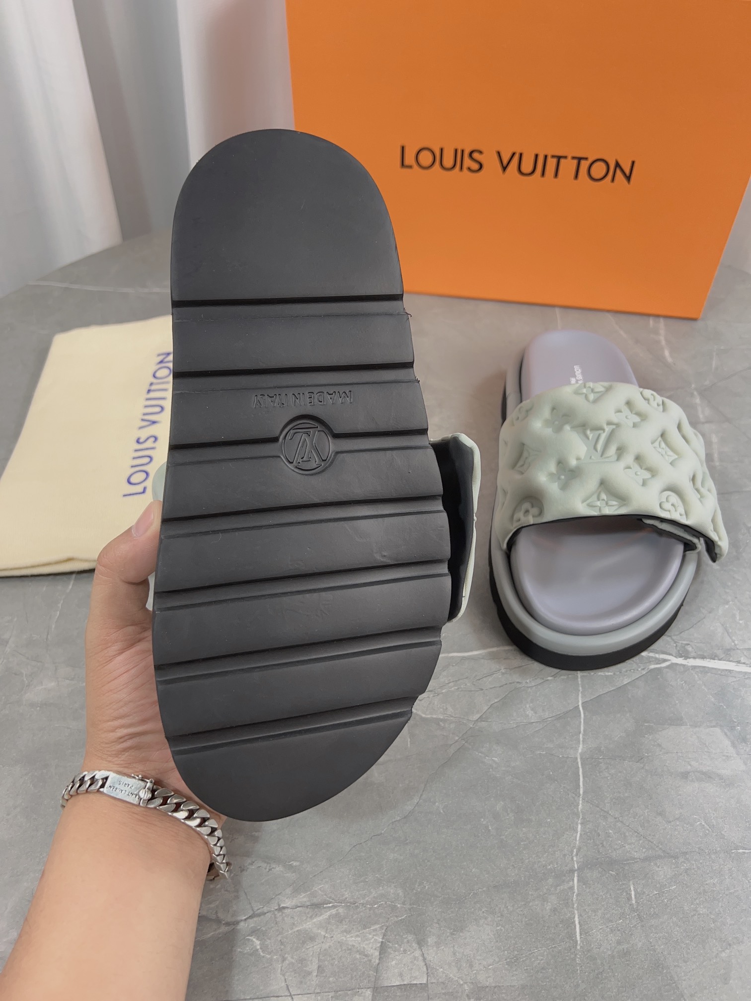 Louis Vuitton Pool Pillow Comfort Flat Sandal Monogram Embossed Slides 9 i1679661603 8381 7