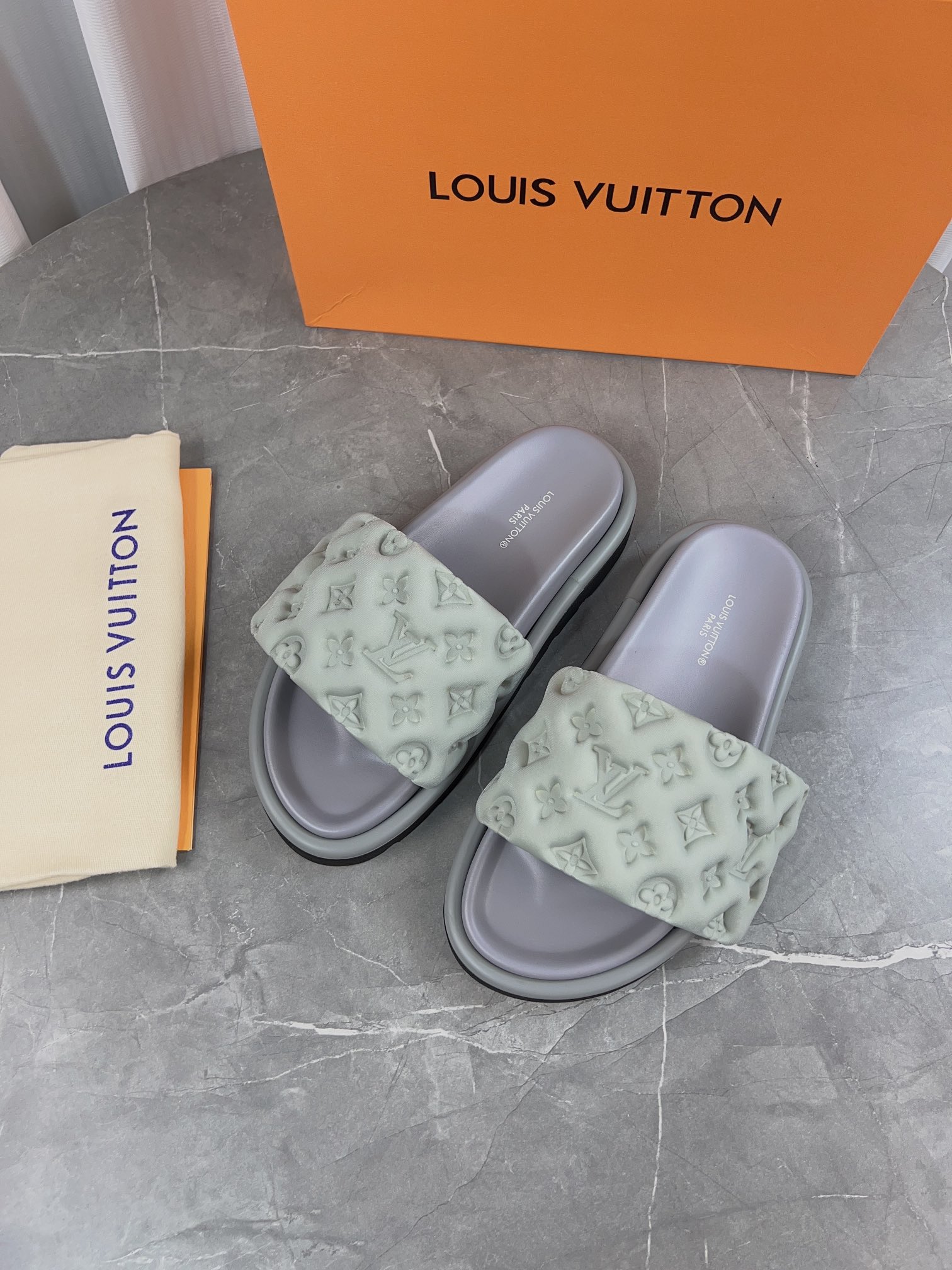 Louis Vuitton Pool Pillow Comfort Flat Sandal Monogram Embossed Slides 4 i1679661603 8559 3
