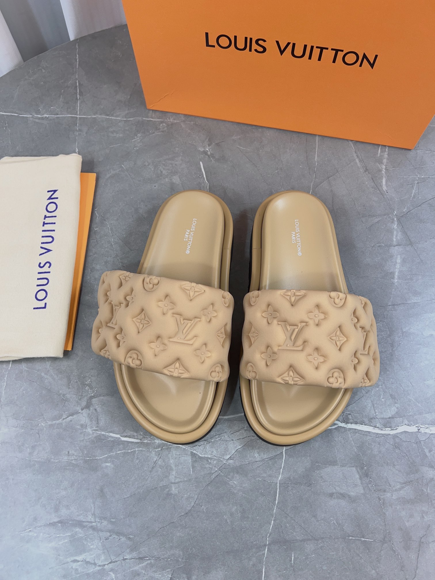 Louis Vuitton Pool Pillow Comfort Flat Sandal Monogram Embossed Beige 3 i1679661651 3456 1