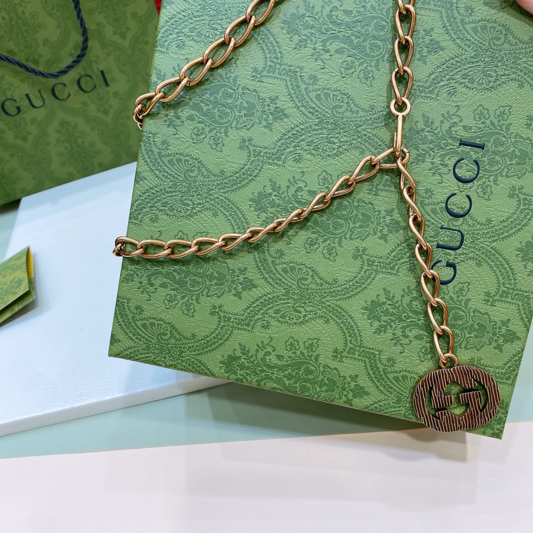 gucci23古金色调金属刻花配件互