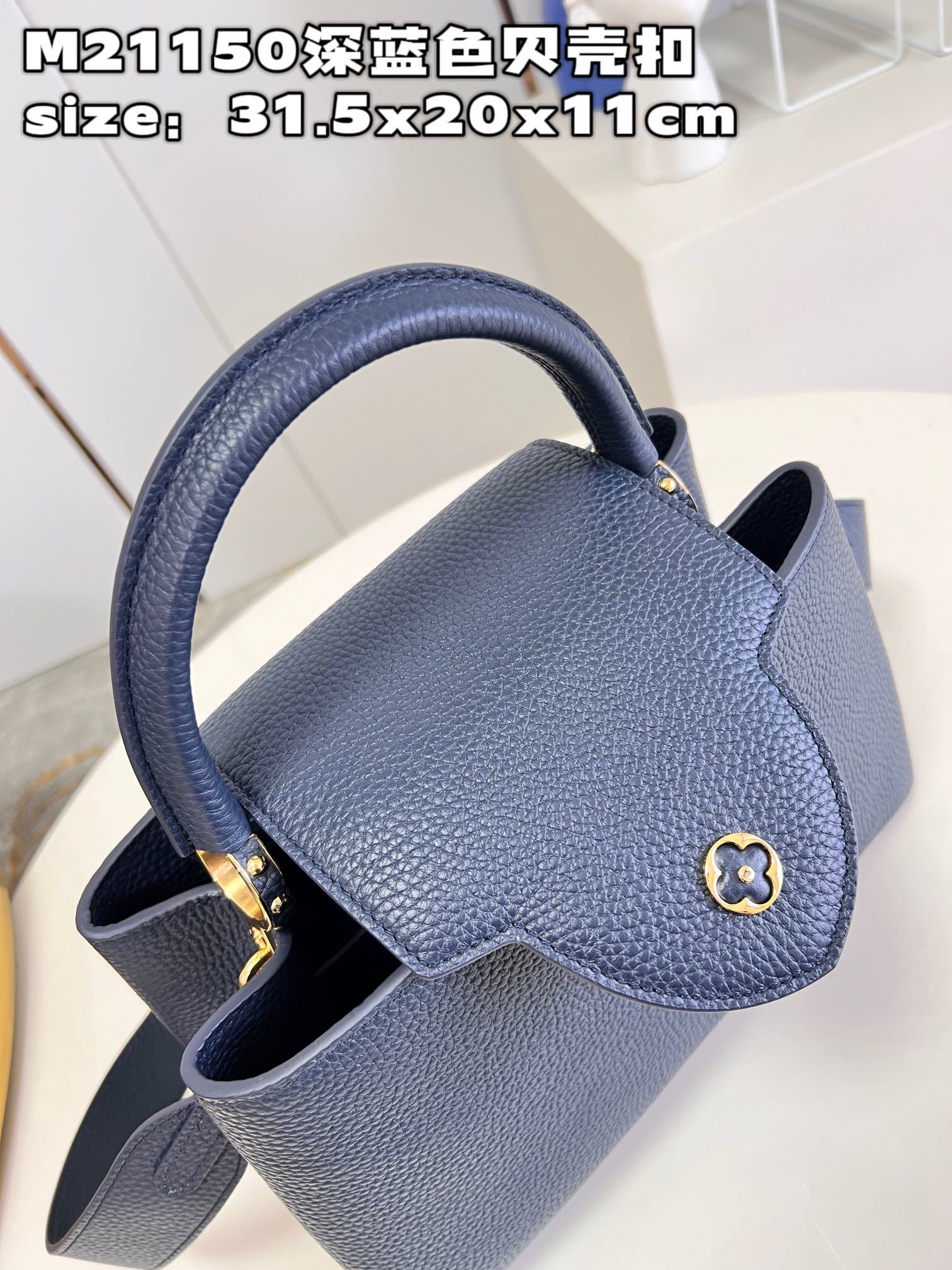 顶级原单M21150深蓝色贝壳扣中号CapucinesMM手袋法国进口小牛皮,闪亮的金属饰件,特有的Ca
