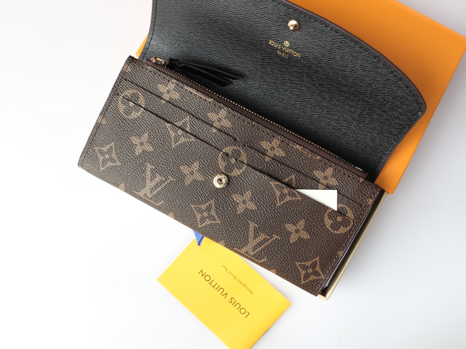 Zip-around wallet with cash and card inside