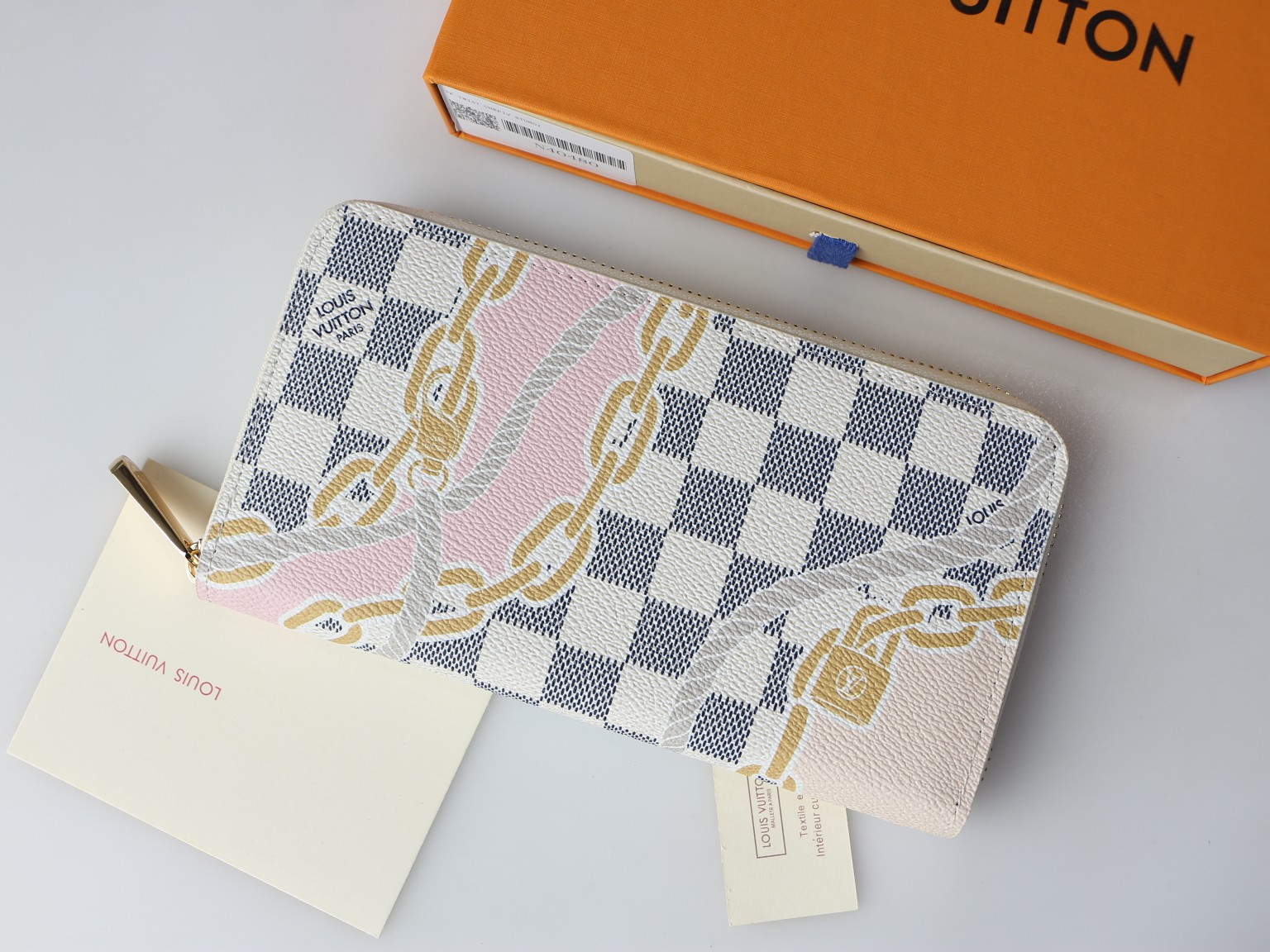 Open view of a genuine leather long zipper wallet showing card slots and compartments