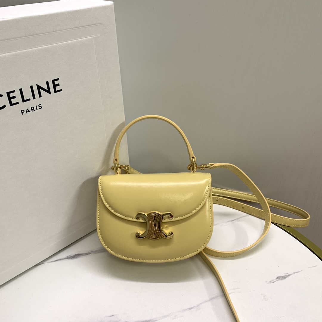 NO:206096,Genuine grade new product is launched Celine23 Early Spring LISA mini saddle bag~besace Arc de Triomphe The real thing is really beautiful, retro and fashionable, it looks good no matter how you match it!  The design of the arc-shaped bottom and flip cover makes it look younger, and the relatively mini style is 10. The handle design is playful and cute. You will fall in love with it at a glance. You can take a photo with a very elegant look. It can be worn on the back and shoulders and can be carried on the hand!  Retro and fashionable cute style~ Large capacity mobile phone can not be placed, can hold keys, tissues, powder, model number 10L063 Pollen yellow Size 15.5-11.5-5 (with original packaging), Celine, celine, celine19860909正品级 新品上线 Celine23早春LISA同款 mini马鞍包～besace 凯旋门 实物真的好美复古又时髦,怎么搭都好看那种！设计圆弧形底部和翻盖更显年轻化,相对迷你的款式 十 手柄设计,又俏皮又可爱,看一眼就会爱上的款 ,拎着拍照可以说优雅十足.可斜背及挂肩可手提！ 风格复古时髦可爱款～ 容量大手机不太放得下,可放钥匙,纸巾,粉饼, 款号10L063花粉黄 尺寸15.5-11.5-5（配原版包装）,赛琳celine,celine,celine,Bag