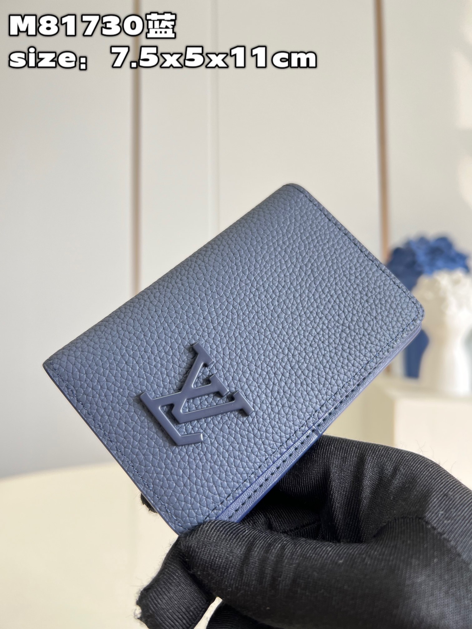 The LV Initials emblem on the wallet is crafted in matching blue metal - Bag 2