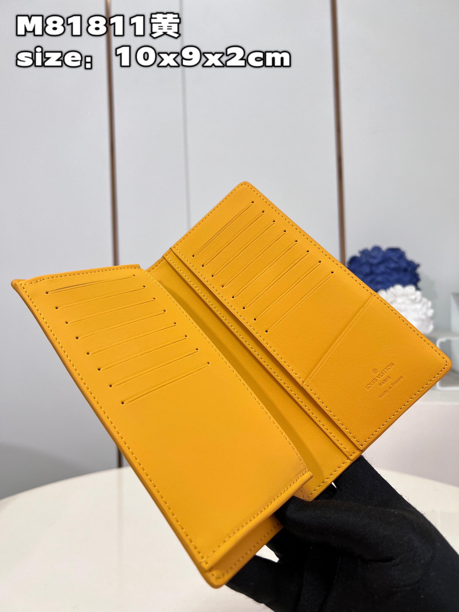This classic Louis Vuitton Brazza Wallet takes on a distinctive new look - Bag 6