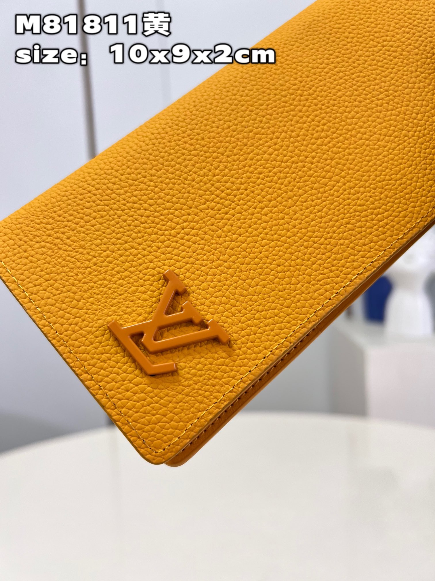 This classic Louis Vuitton Brazza Wallet takes on a distinctive new look - Bag 3