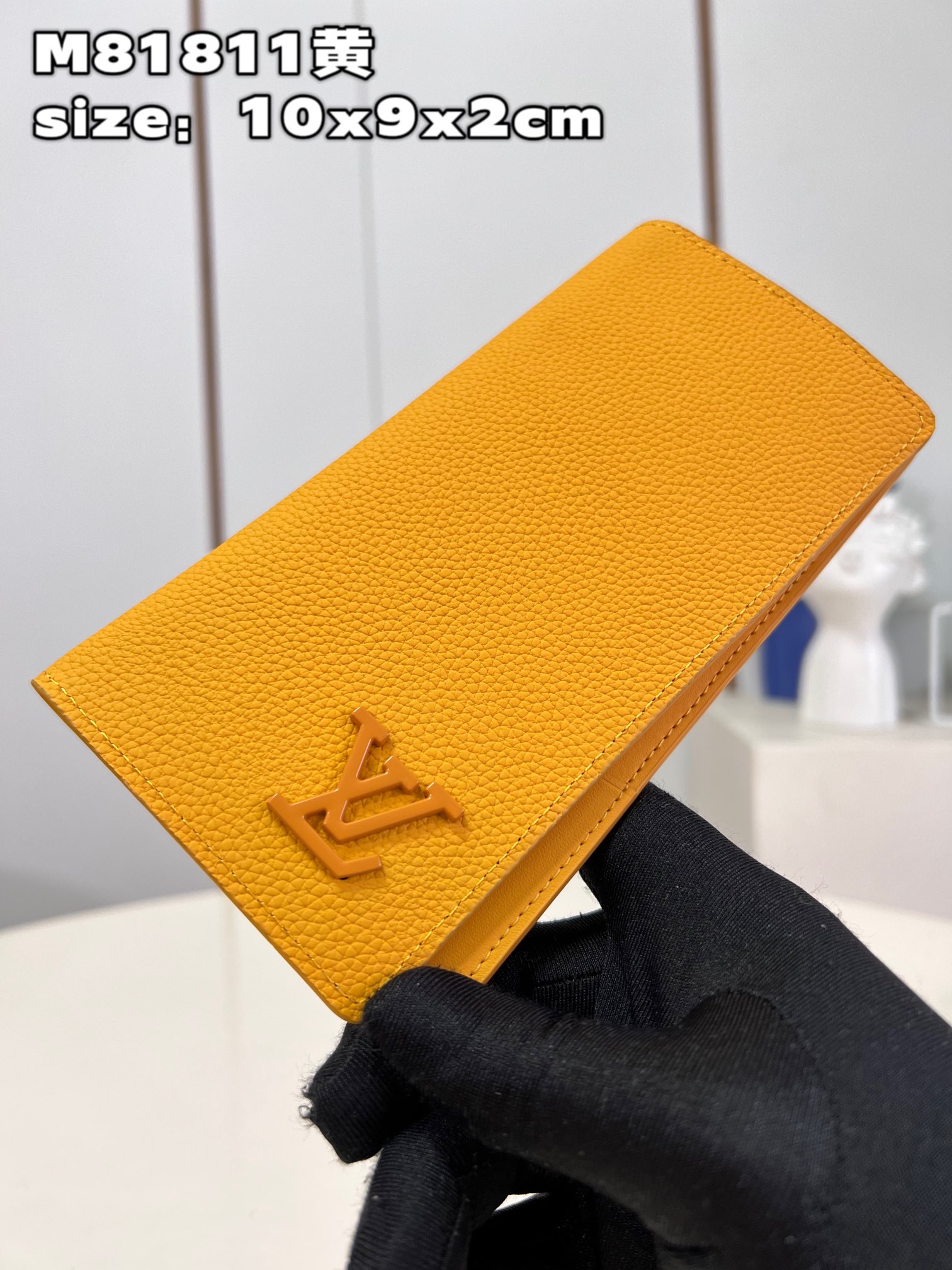 This classic Louis Vuitton Brazza Wallet takes on a distinctive new look - Bag 2