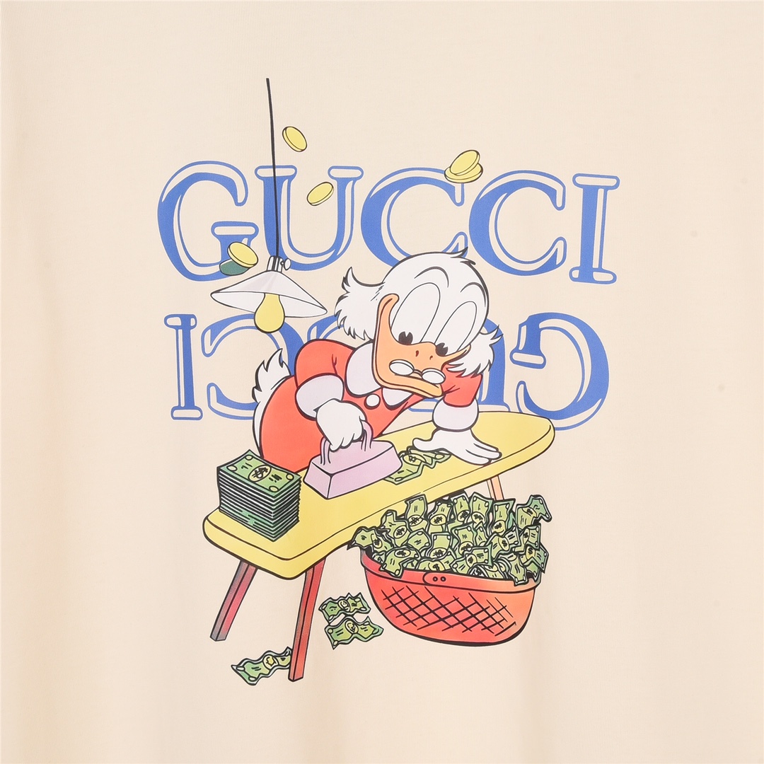 160 GUCCI 古驰23SS联名迪士尼唐老鸭美金卡通图案印花短袖