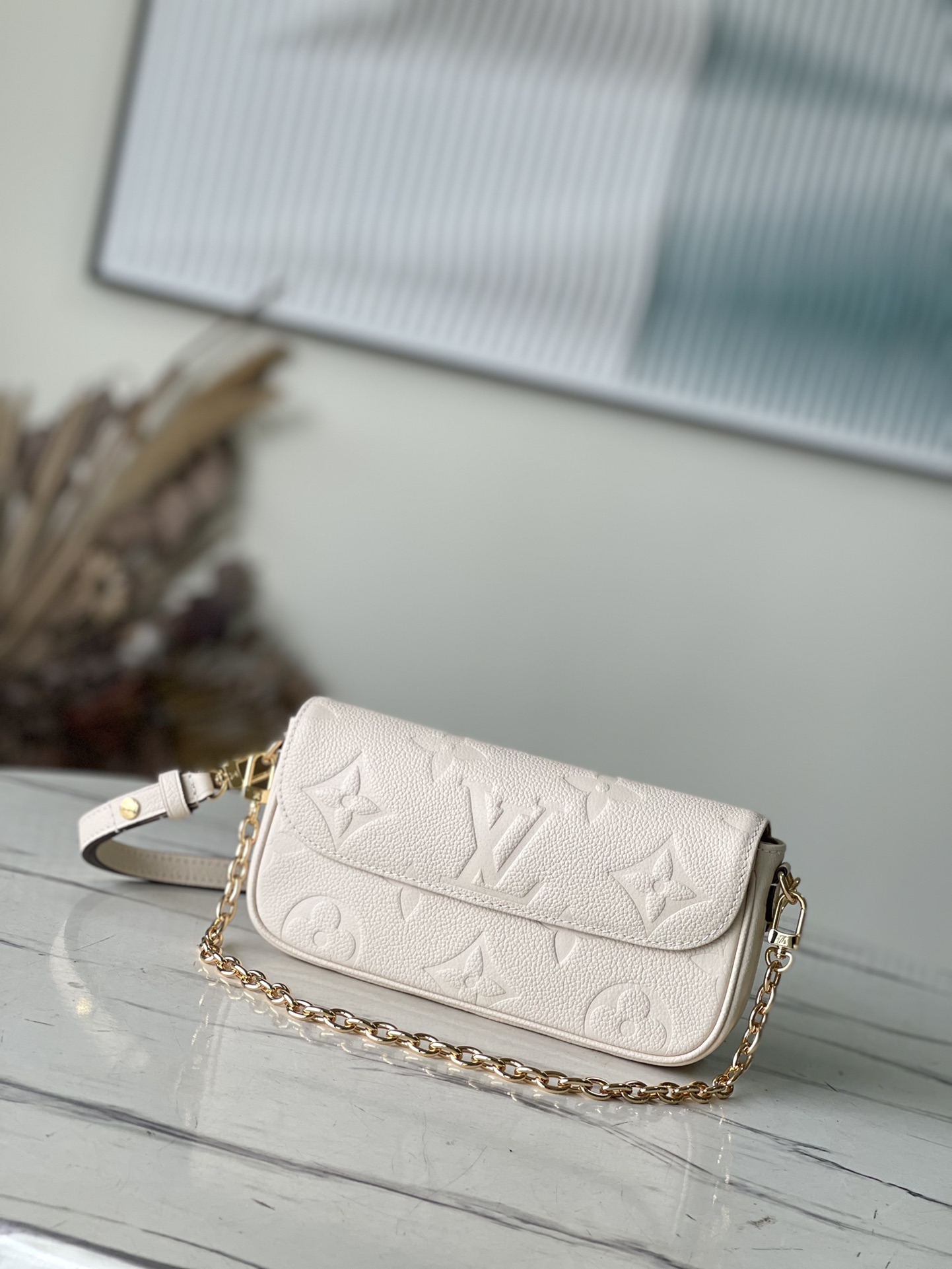 Wallet on Chain Ivy Monogram Empreinte Leather M82210