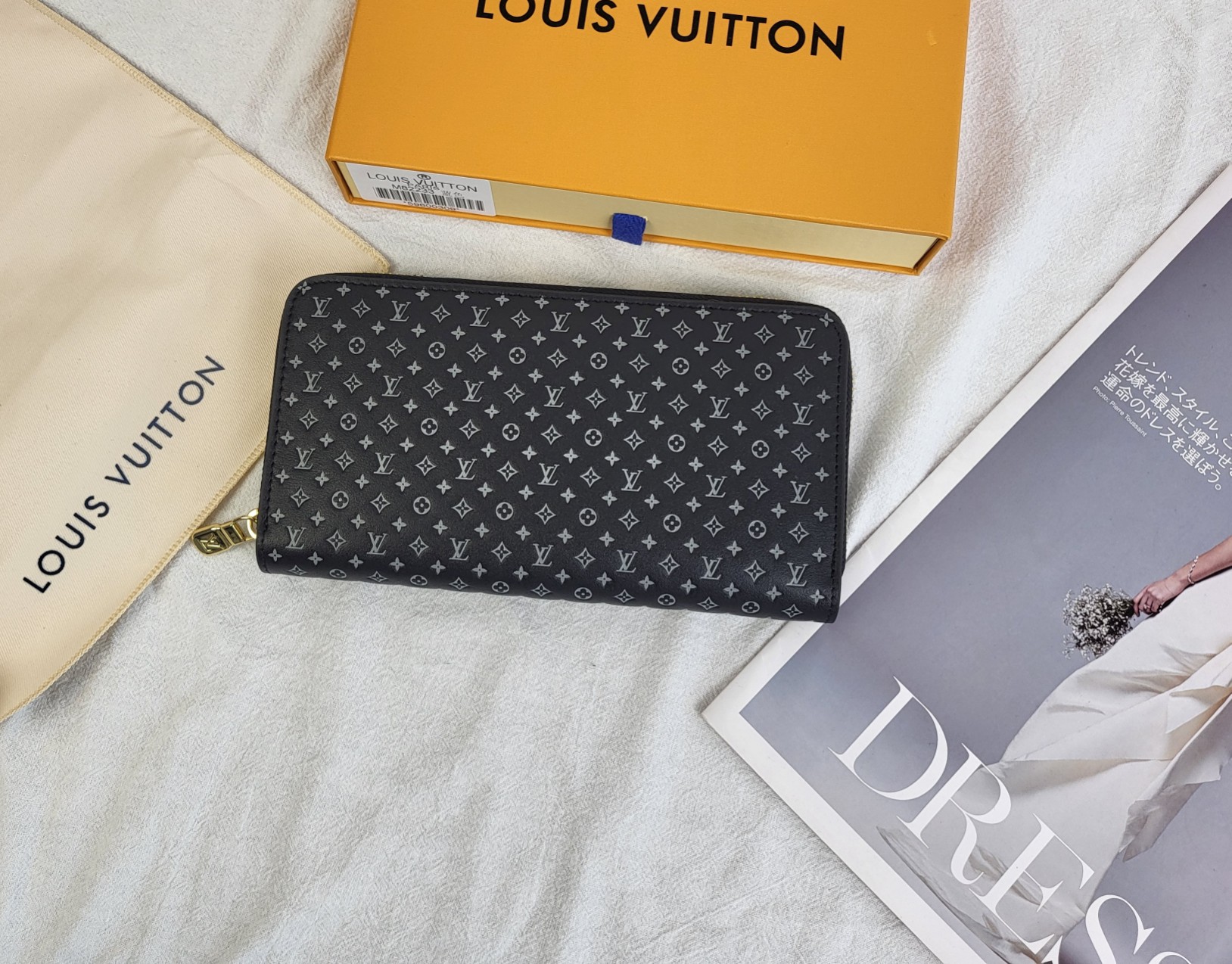 Front view of a luxury leather long zipper wallet