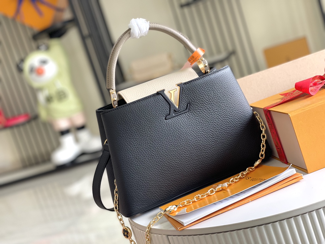 The Capucines MM handbag receives a seasonal refresh: metallic Monogram - Bag 2