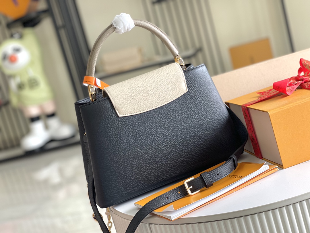 The Capucines MM handbag receives a seasonal refresh: metallic Monogram - Bag 4