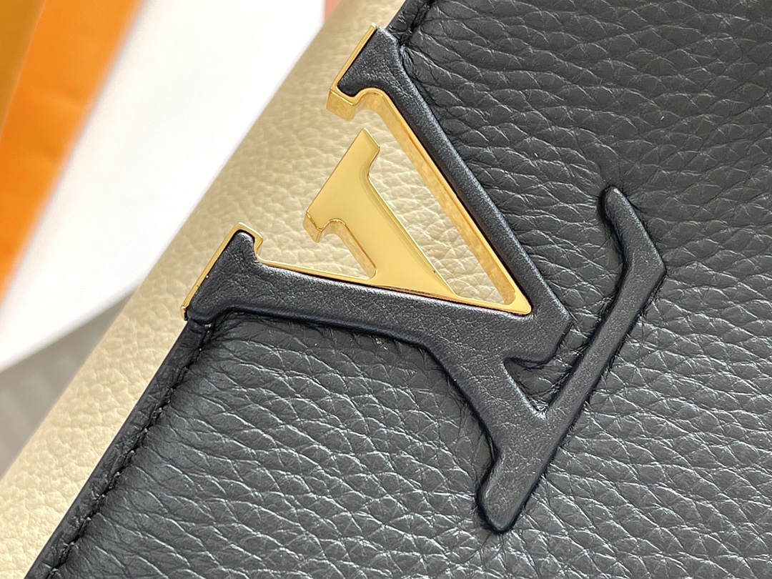 The Capucines MM handbag receives a seasonal refresh: metallic Monogram - Bag 7