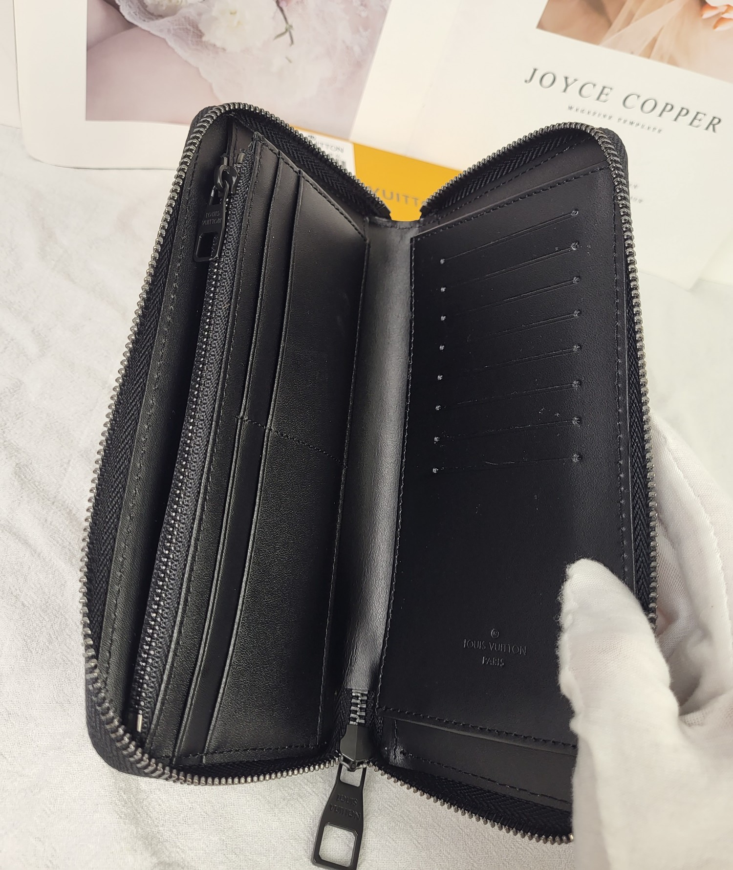 The leather wallet is in use