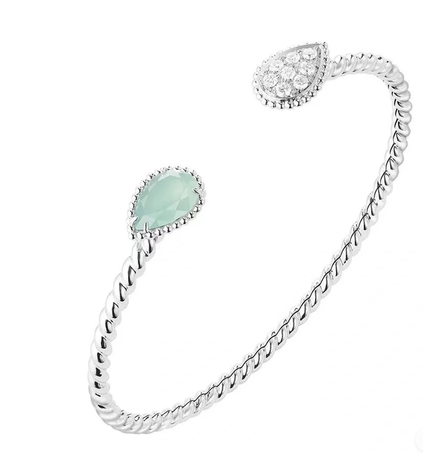 Luxurious Poseidon Water Drill: Modern Edifice Adorned with Diamonds and Gold.