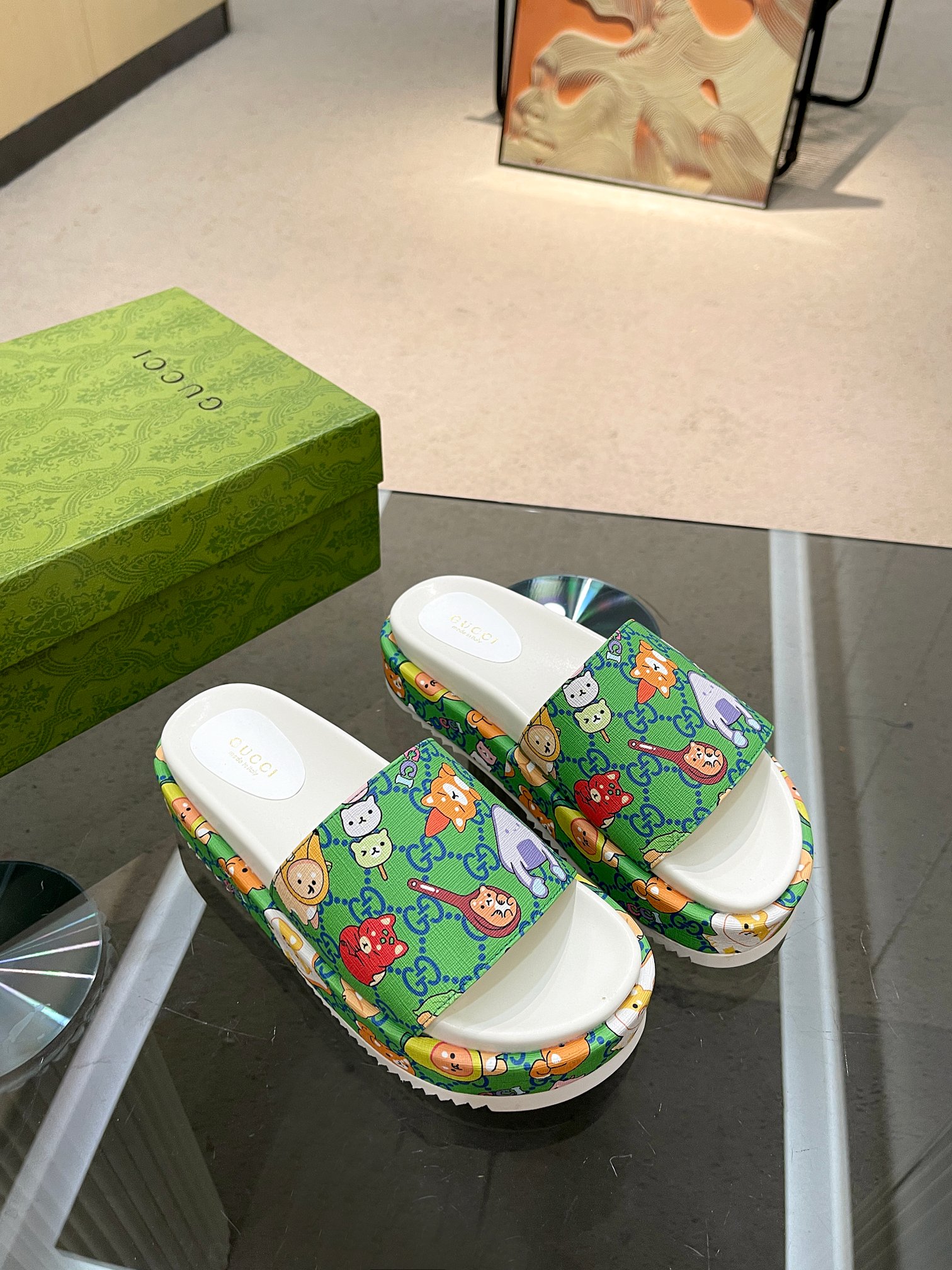 Gucci Limited Edition Platform Slides in Green with Cartoon Print 1 Gucci Limited Edition Platform Slides in Green with Cartoon Print