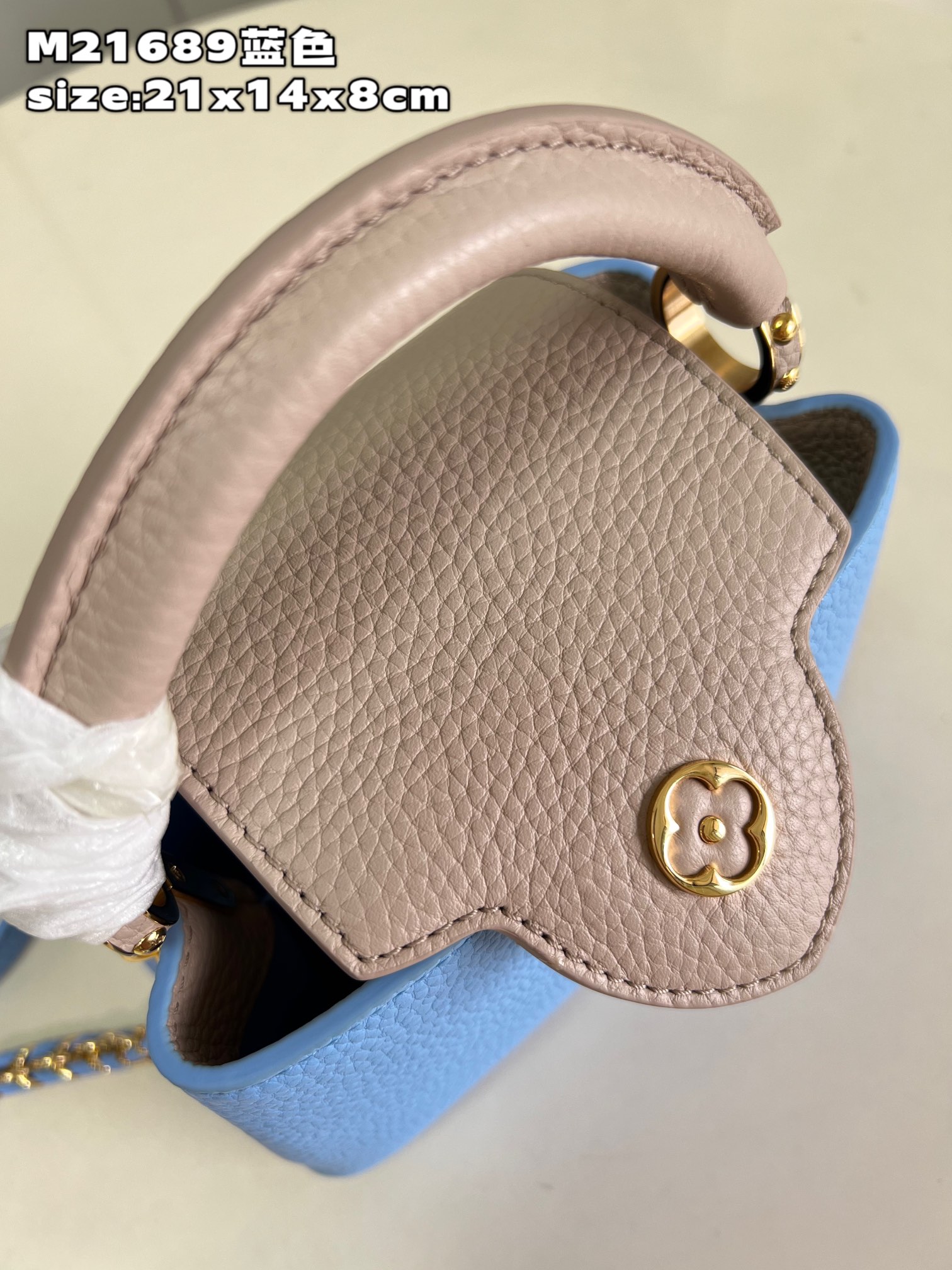 顶级原单M21689蓝色迷你此款Taurillon皮革版Capucinesmini手袋呈现柔美清新的色调