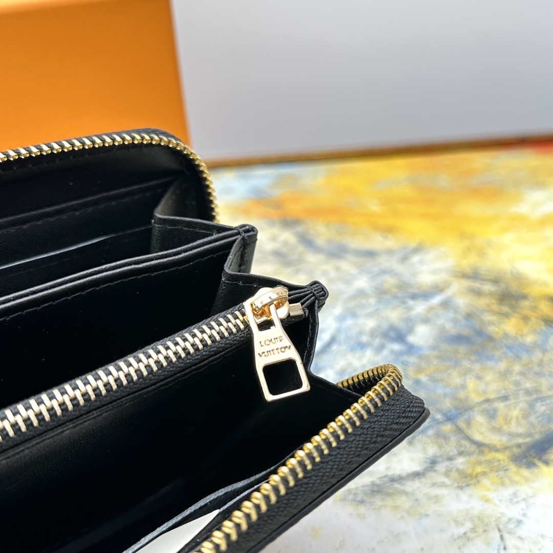 Bifold wallet held in hand