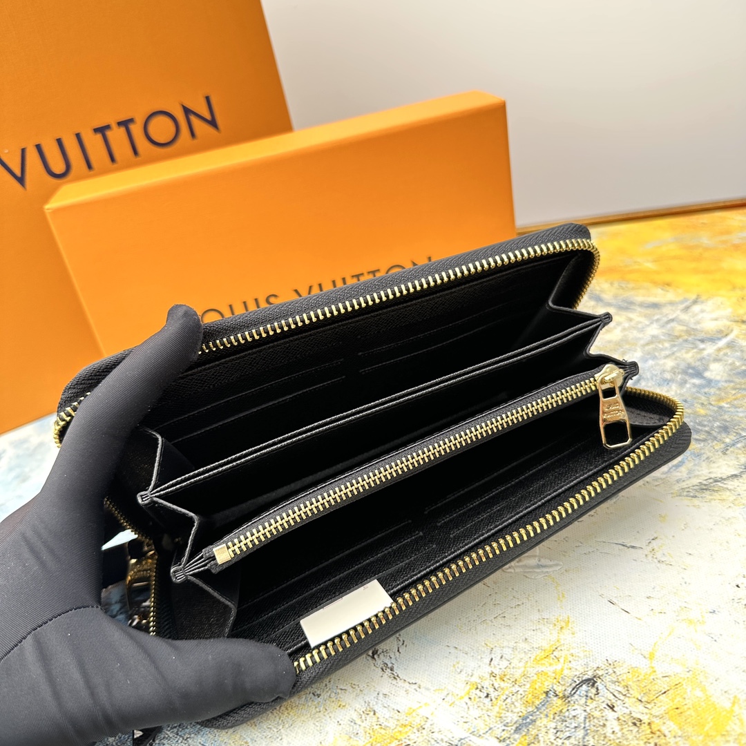 Stitching detail on the leather zip around wallet.